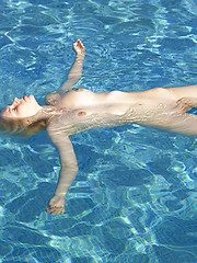 Young girl Maya relaxing in the water