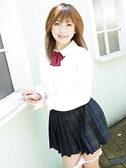 Shy japanese girl  Yu Mizuki posing in school uniform