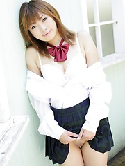 Shy japanese girl  Yu Mizuki posing in school uniform