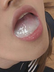 Brown-haired japanese girl swallowing cum