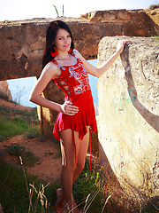Nichole soft allure and delicate, slender body nicely contrasts with the rugged terrain and rocky ruins.