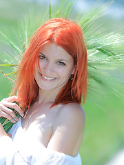Surrounded by vast green grass, Violla\'s alluring beauty and charmingg allure stands out, with her pale smooth skin, fiery red hair, pink, perky boobs, and delectable labia.