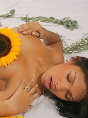 Karla Spice wears nothing but flowers over her naked body