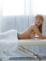 Mesmerizing teenage redhead gets her cunt fucked by the masseur