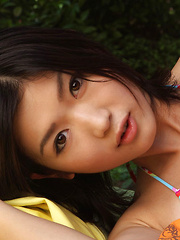 Noriko Kijima Asian with big tits in bath suit plays outdoor