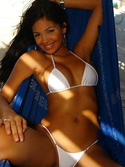 Karla has some fun in her bikini at a beach house