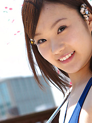 Kana Yuuki Asian in bath suit plays with umbrella in the balcony
