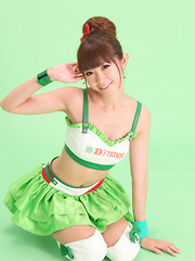 Zuo Qi Asian doll in cute outfit smiles like a true princess