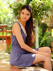 Connie portrays a sweet and cute garden nymph with her long, wavy brown hair, naturally beautiful face without any hint of makeup, and an exquisite body with womanly curves.