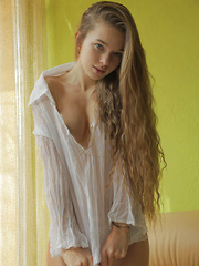 Milena D flips her long, beautiful hair to the side and exposes her amazing breasts.